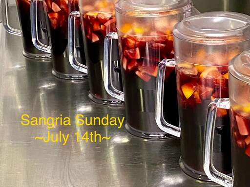 Pitchers of  red sangria waiting for the glass.